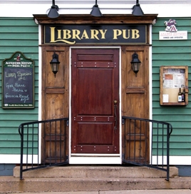 This photo of the Library Pub in Wolfville, Nova Scotia, which is operated by alumni of Acadia University, was taken by Bill Davenport of Kentville, Canada.  They go to the head of the class ... combining my two favorite places to visit ... libraries and pubs for books and beer!